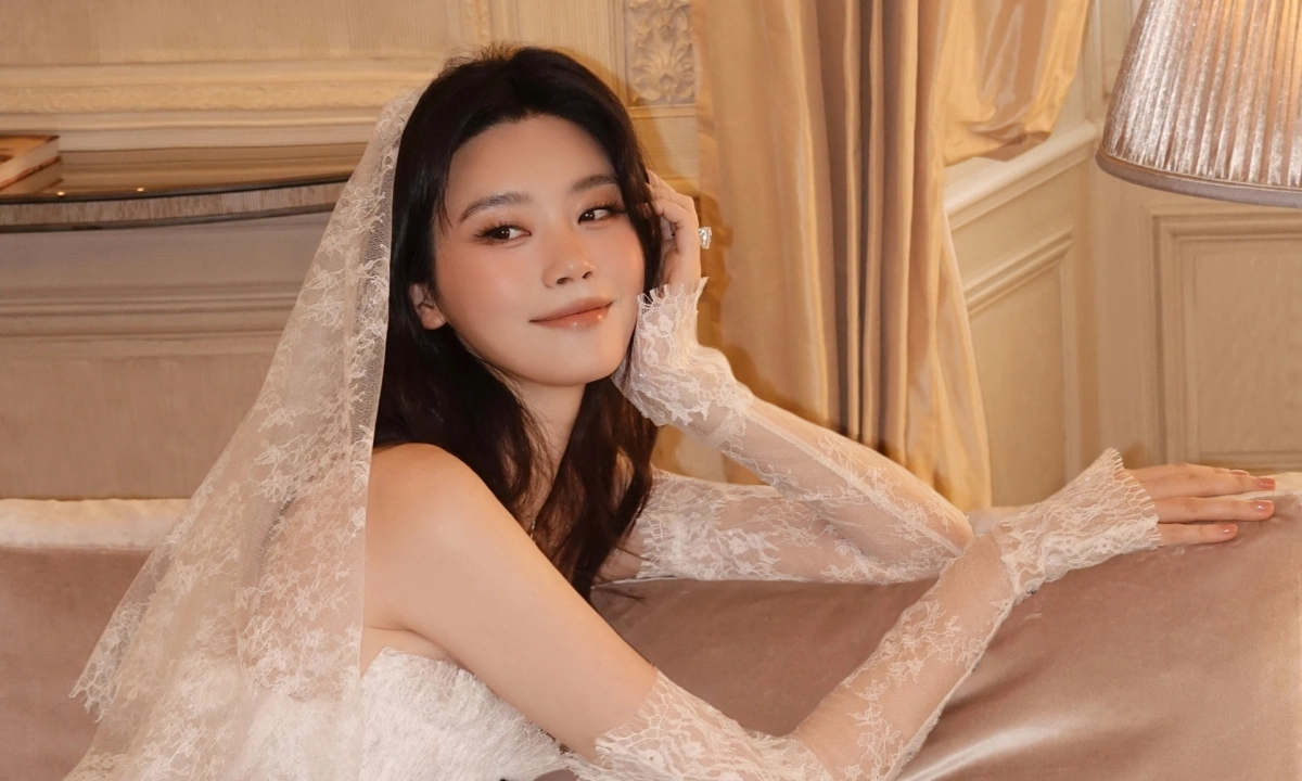 Thưởng tân thủ F168: Hề Mộng Dao rạng rỡ trong váy cưới thiết kế Việt - hình ảnh - f168win.vip